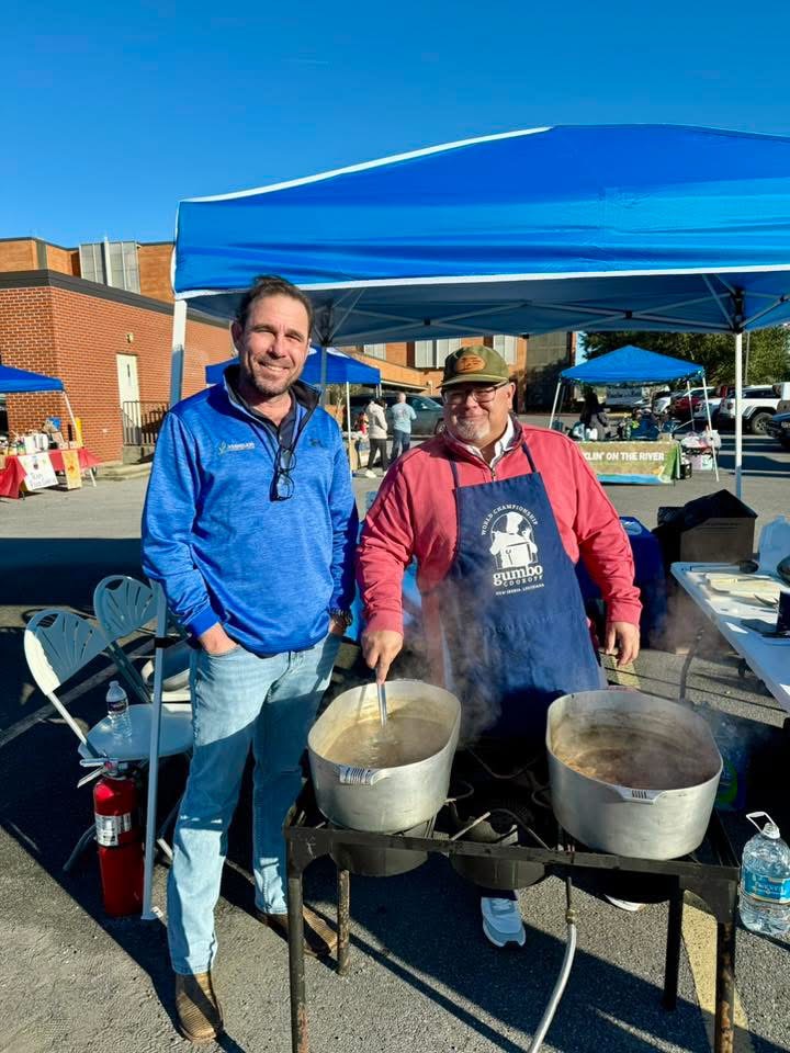 Brandon E. Breaux and Russell P. Suire Jr. representing Vermilion Health Care Center at a gumbo cookoff